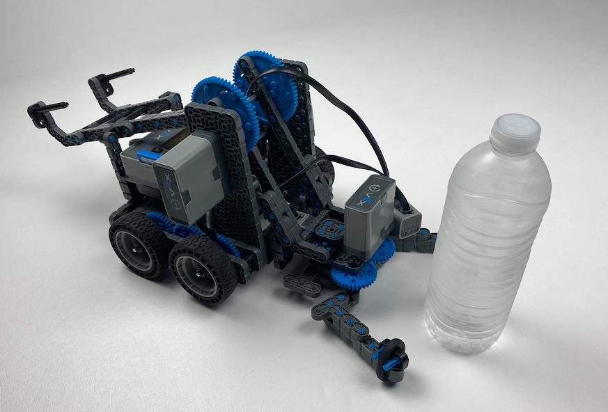image of the Clawbot approaching a water bottle