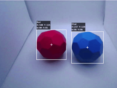 Example of a Red and Blue Color Signature in the AI Vision Sensor Snapshot window. To the left is a Red object and to the right is an object detected as Blue. Each object has a white box around it to indicate it is 'detected' and the X, Y, Width and Height is reported for each.