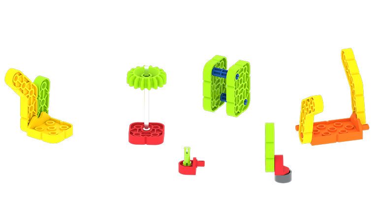 ഗെയിം പീസുകൾ എങ്ങനെ നിർമ്മിക്കാമെന്നതിന്റെ ഉദാഹരണങ്ങൾ ചിത്രീകരിക്കുന്നതിനായി, വ്യത്യസ്ത വലുപ്പങ്ങൾ, ആകൃതികൾ, ഭാരങ്ങൾ എന്നിവ സൃഷ്ടിക്കുന്നതിനായി വിവിധ VEX GO കിറ്റ് പീസുകളിൽ നിന്ന് ആറ് വ്യത്യസ്ത ഗെയിം പീസുകൾ നിർമ്മിച്ചിരിക്കുന്നു.