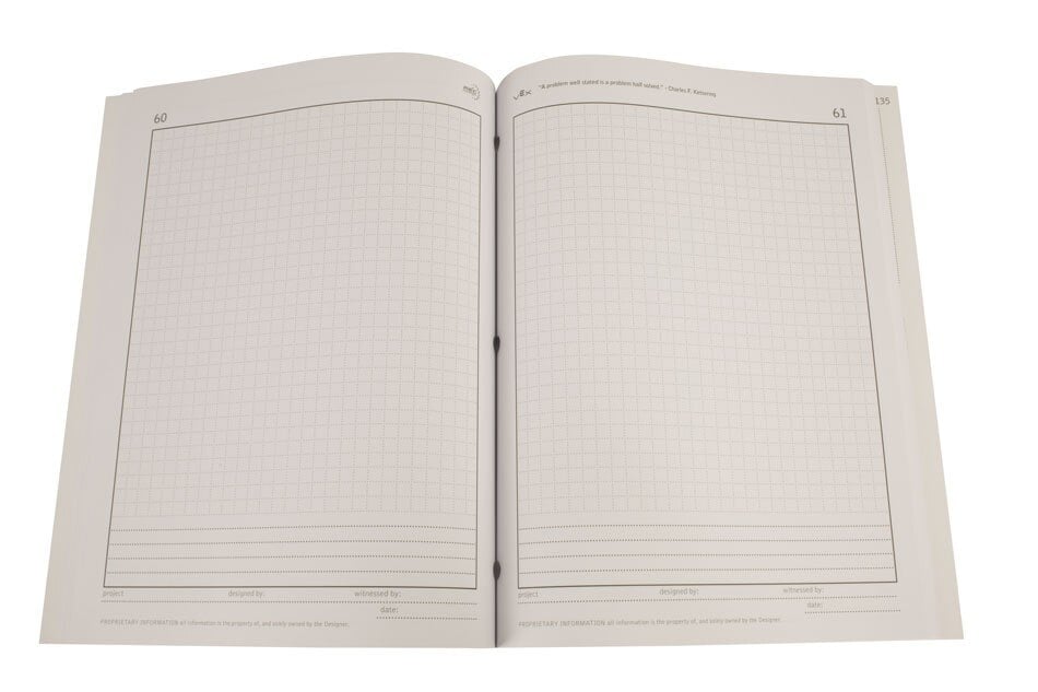 A Blank Engineering Notebook Lying Open With Gridded Paper