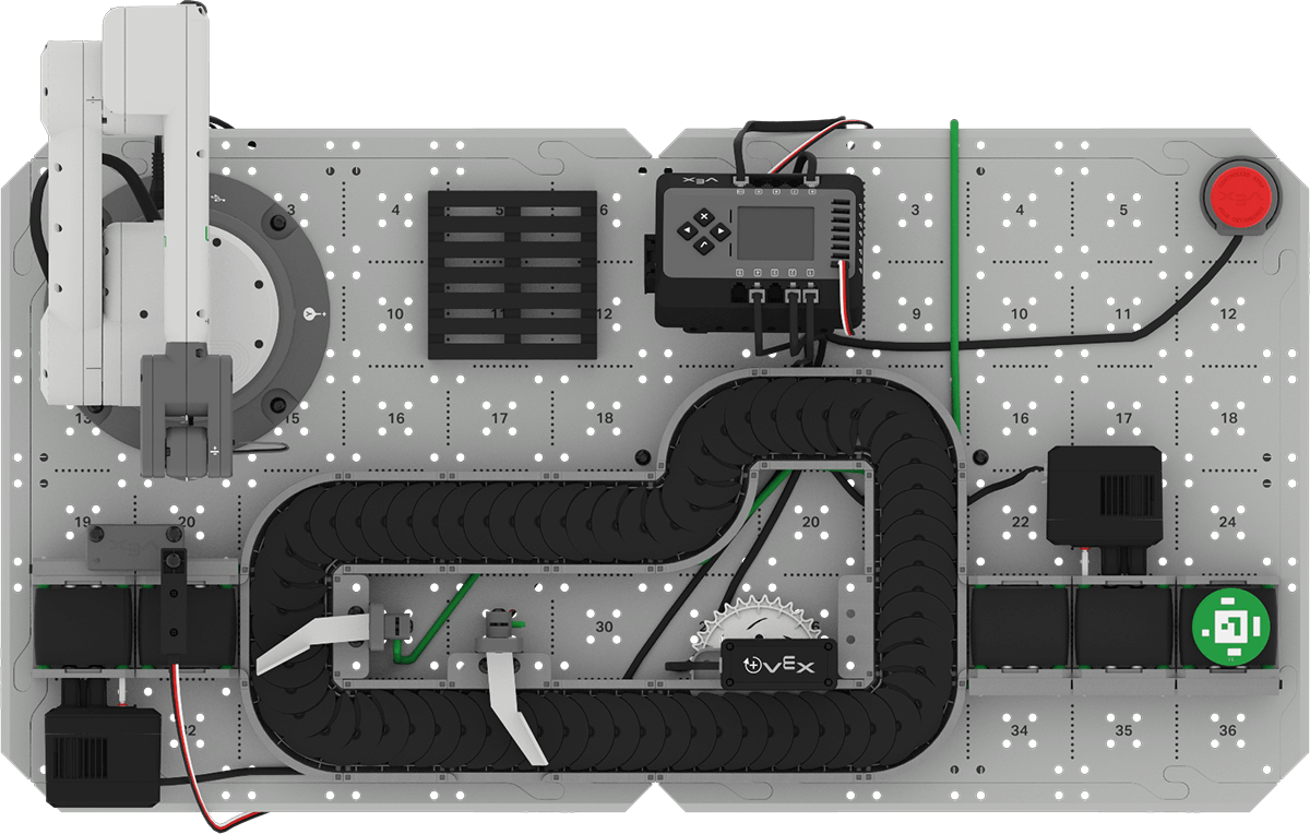 Top down view of the CTE Workcell Base build with a green disk placed at the start of the Entry Conveyor.
