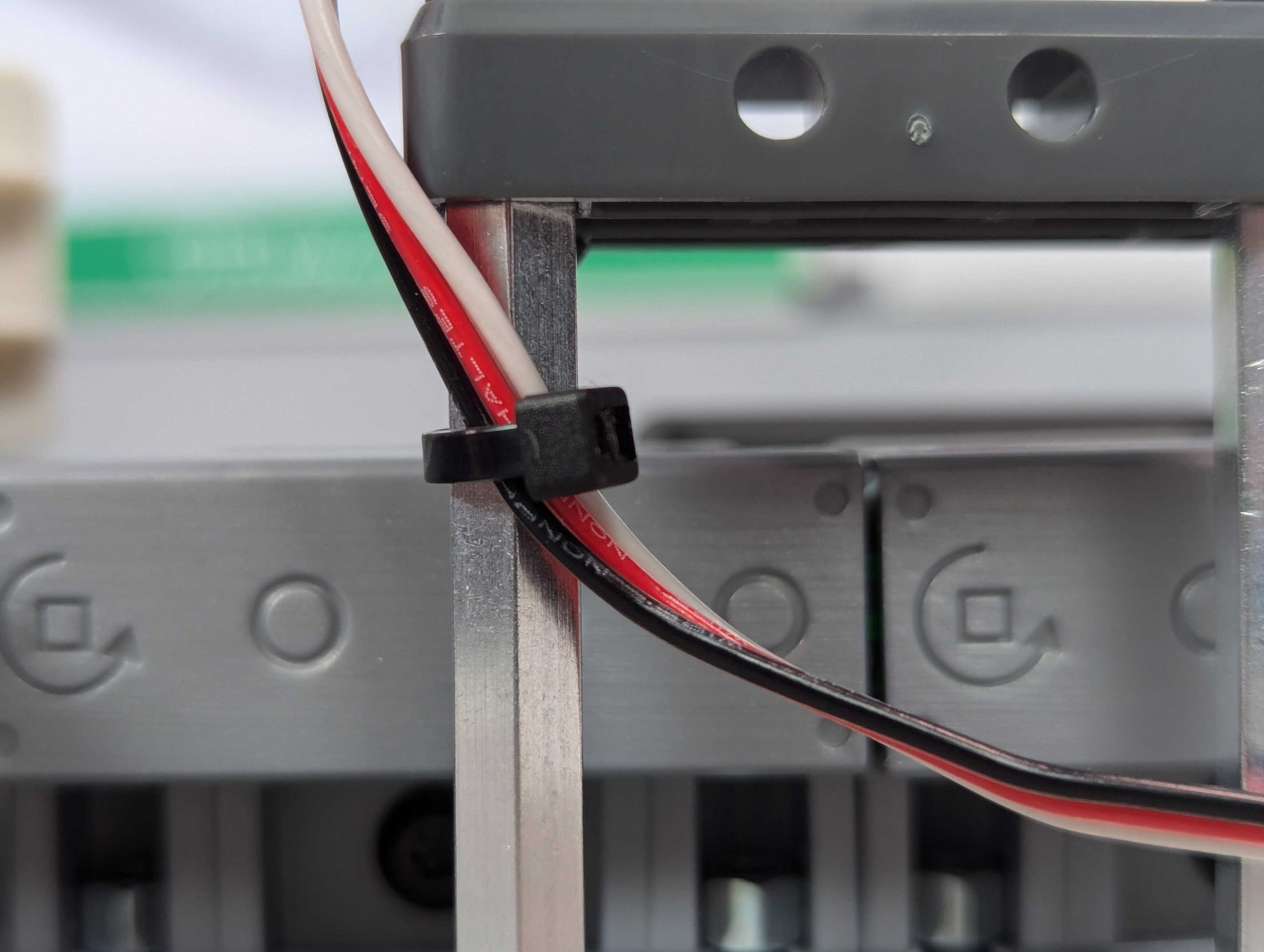 Zip tie securing a cable running to the Object Sensor to a standoff.