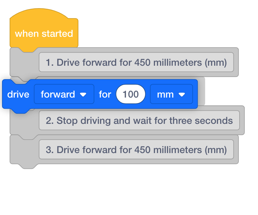 Cùng một dự án VEXcode GO với Drive cho khối được kéo vào giữa các khối nhận xét thứ nhất và thứ hai.