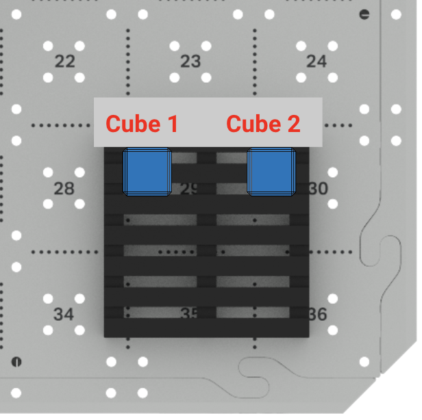 A top down view only showing the installed pallet on the CTE Tile. It shows two blue cubes, one placed on the top left corner and one on the top right corner of the pallet. The top left blue cube is labeled as Cube 1, and the top right blue cube is labeled as Cube 2.