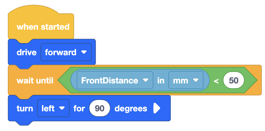 VEXcode VR blocks project that drives forwards until it reaches a wall and then turns left. The whole project reads When Started Drive Forward and Wait Until Front Distance in millimeters is less than 50, after which Turn Left for 90 degrees.