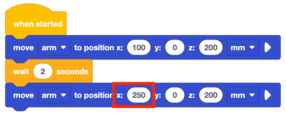 The same project, with the x parameter of the second move to position block highlighted in a red box. The parameter is set 250. The block now reads move arm to position x 250 y 0 z 200mm.