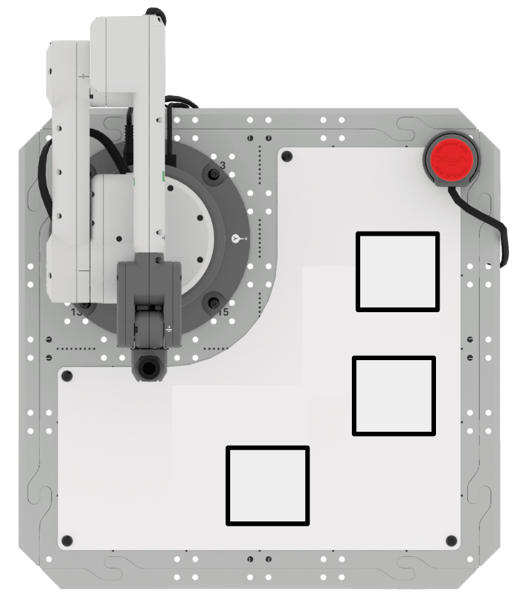 Top down image of the 6-Axis arm on a Tile with a whiteboard attached. Three black squares, all the same size, can be seen drawn on the right and bottom areas of the whiteboard.