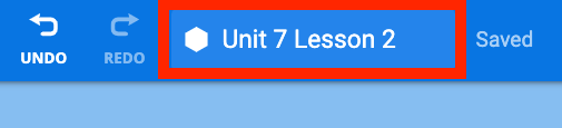The VEXcode Toolbar showing the project name. The Project name reads Unit 7 Lesson 2 and is highlighted with a red box.