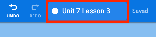 The VEXcode Toolbar showing the project name which reads Unit 7 Lesson 3. The project name is highlighted with a red box.