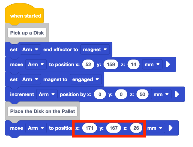 The same project with the x, y, and z parameters set to x 171, y 167, and z 26. The second comment section of the project now reads Place the Disk on the Pallet, move arm to position x 171, y 167, z 26 mm.