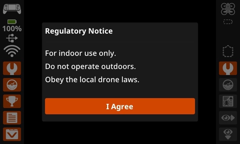 The VEX AIR Drone Controller screen with a regulatory notice pop up in the center that reads for indoor use only. Do not operate outdoors. Obey the local drone laws. There is an I Agree button below the text centered on the screen.