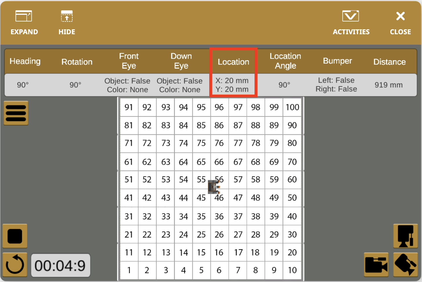 The VR playground after running the 'Location' example project. The dashboard is open and the robot's location is highlighted with a red box, with an X value of 20 millimeters and a Y value of 20 millimeters.