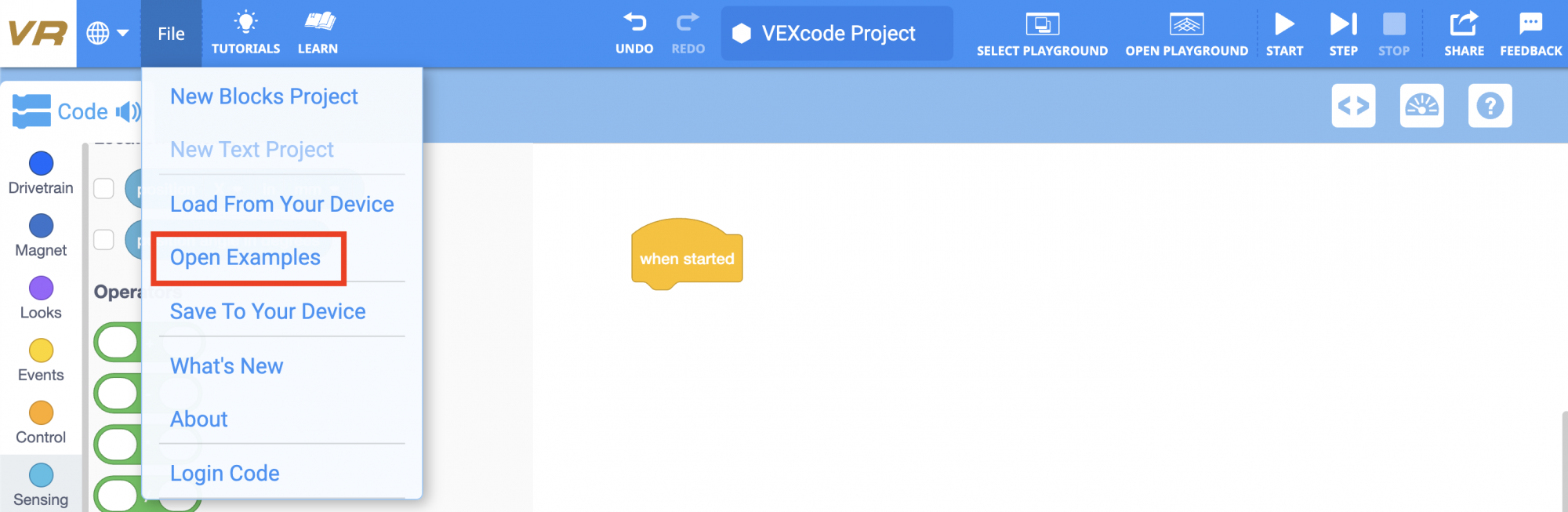 VEXcode VR Toolbar with the File menu open and Open Examples highlighted in a red box. Open Examples is the fourth menu item beneath New Blocks Project, New Text Project, and Load From Your Device.