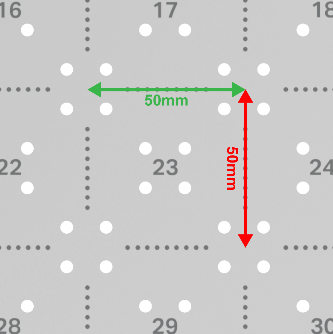 Close up of a square on the CTE Workcell platform, with the edge lengths marked as 50mm.