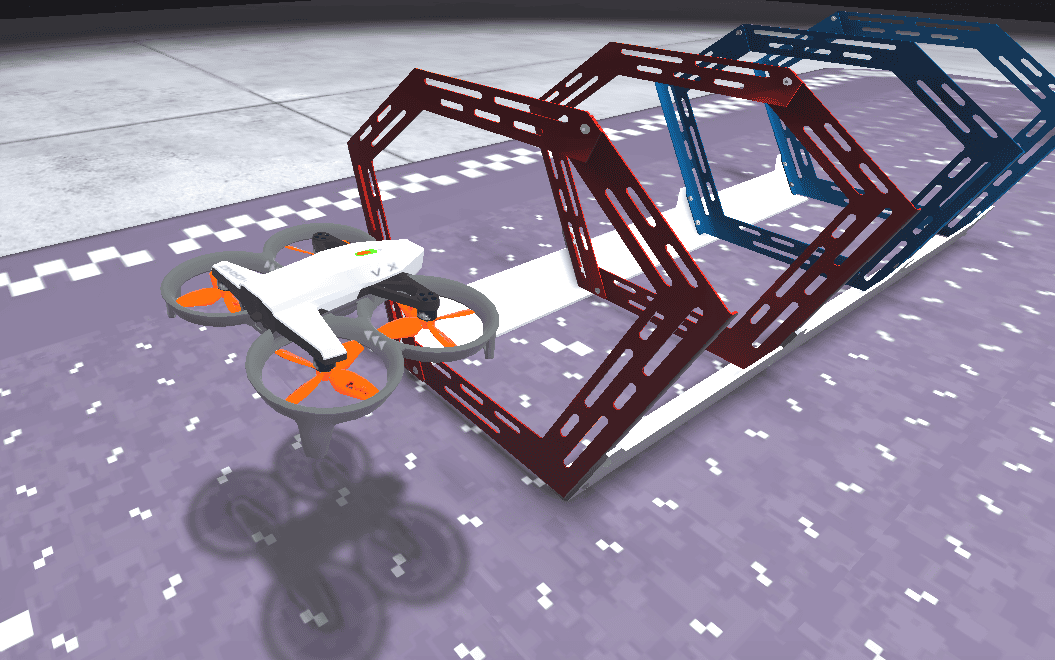 A VEX AIR drone position in front of the ring tunnel on the competition layout. The ring tunnel has two red rings and two blue rings lined up in a row.