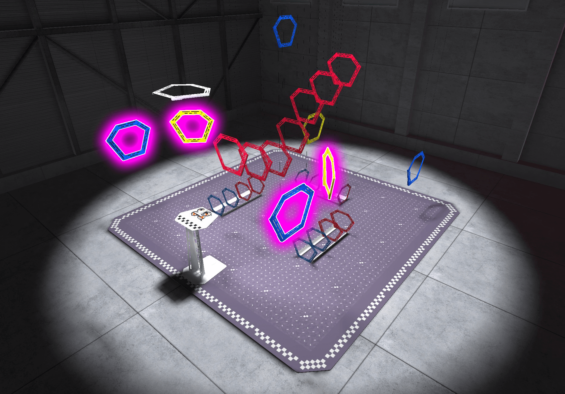 An aerial view of the VEX AIR Flight Simulator in the Rings layout, with the two blue and two yellow rings closest to the platform highlighted, indicating which rings to fly through to complete the bowtie pattern.