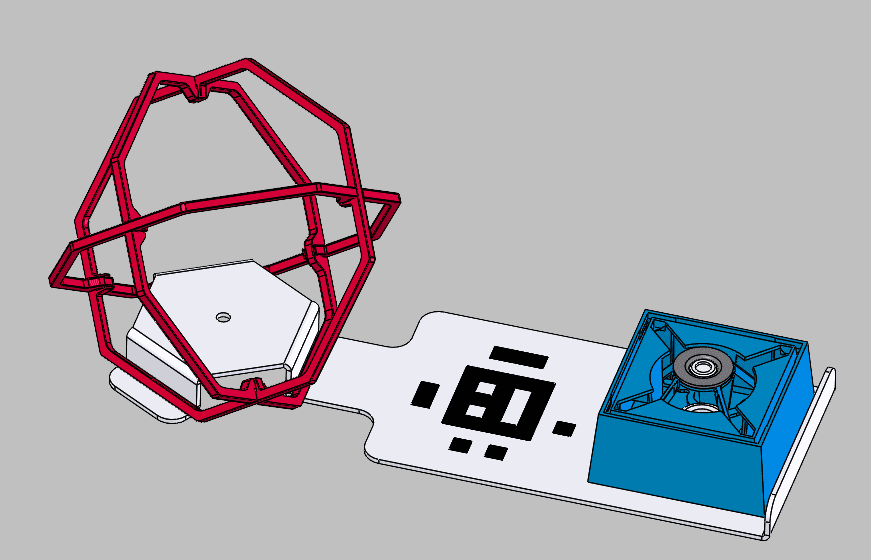 Field plate with an orbit ball positioned around the base on the left and a cargo object mounted on the right.