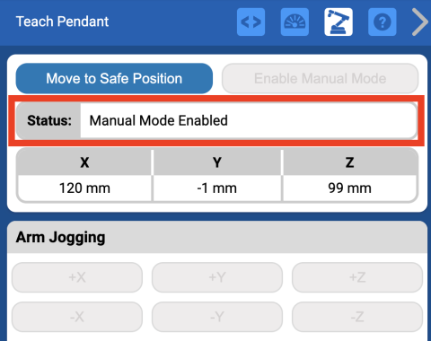 Image of the teach pendant with the manual mode status highlighted and the jogging buttons disabled