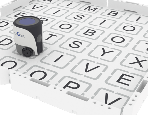 A VEX AIM Coding Robot on a field with different letters in the squares on the field making a word search puzzle.